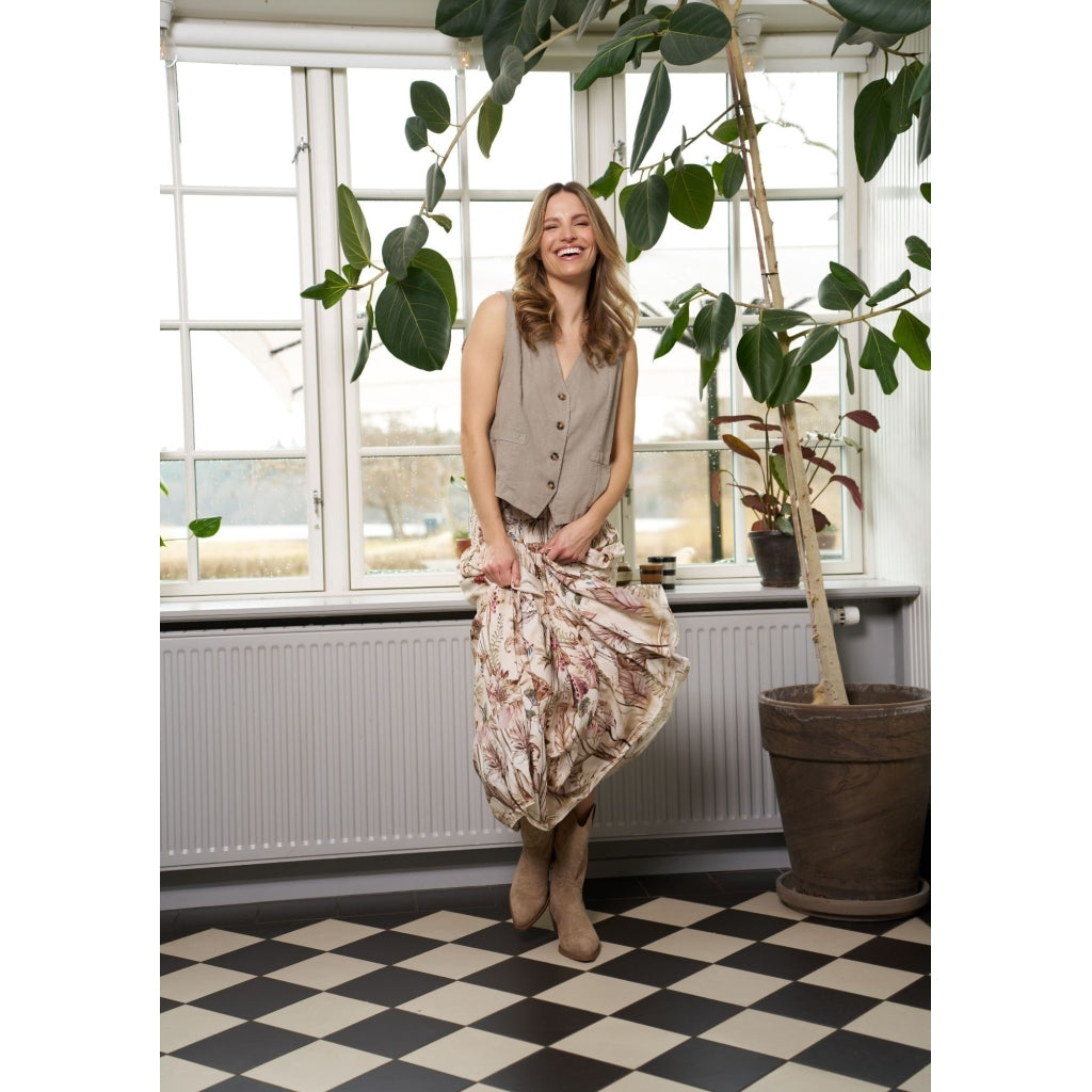 Marta, Evelia Vest